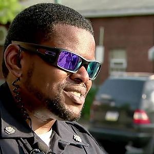 Officer Picks Up Tab for Couple Refusing to Sit Next to Him - YouTube