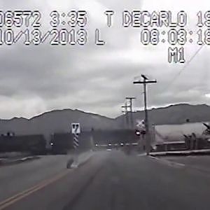 Girl running from police plays chicken with a train - see what happens